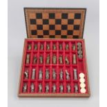 Chess set Romans vs. Teutons, 2nd half 20th century Box with attached, removable chess board, this