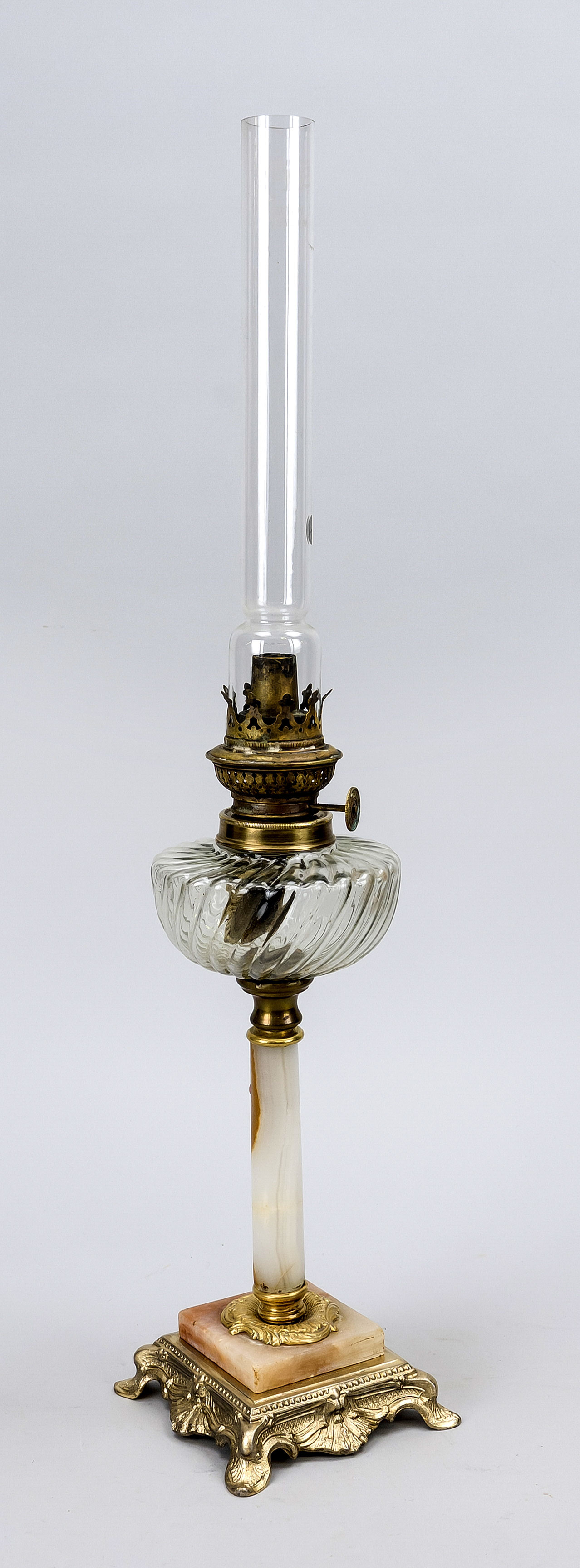 Petroleum lamp, late 19th century, twisted glass tank on column shaft, base with brass mount and