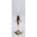 Petroleum lamp, late 19th century, twisted glass tank on column shaft, base with brass mount and