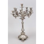 Large nine-flame candlestick, 20th century, plated, round domed stand on 3 feet, baluster shaft, top