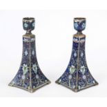 A pair of cloisonné candlesticks, Japan or China, circa 1900, lotus flowers and tendrils on a