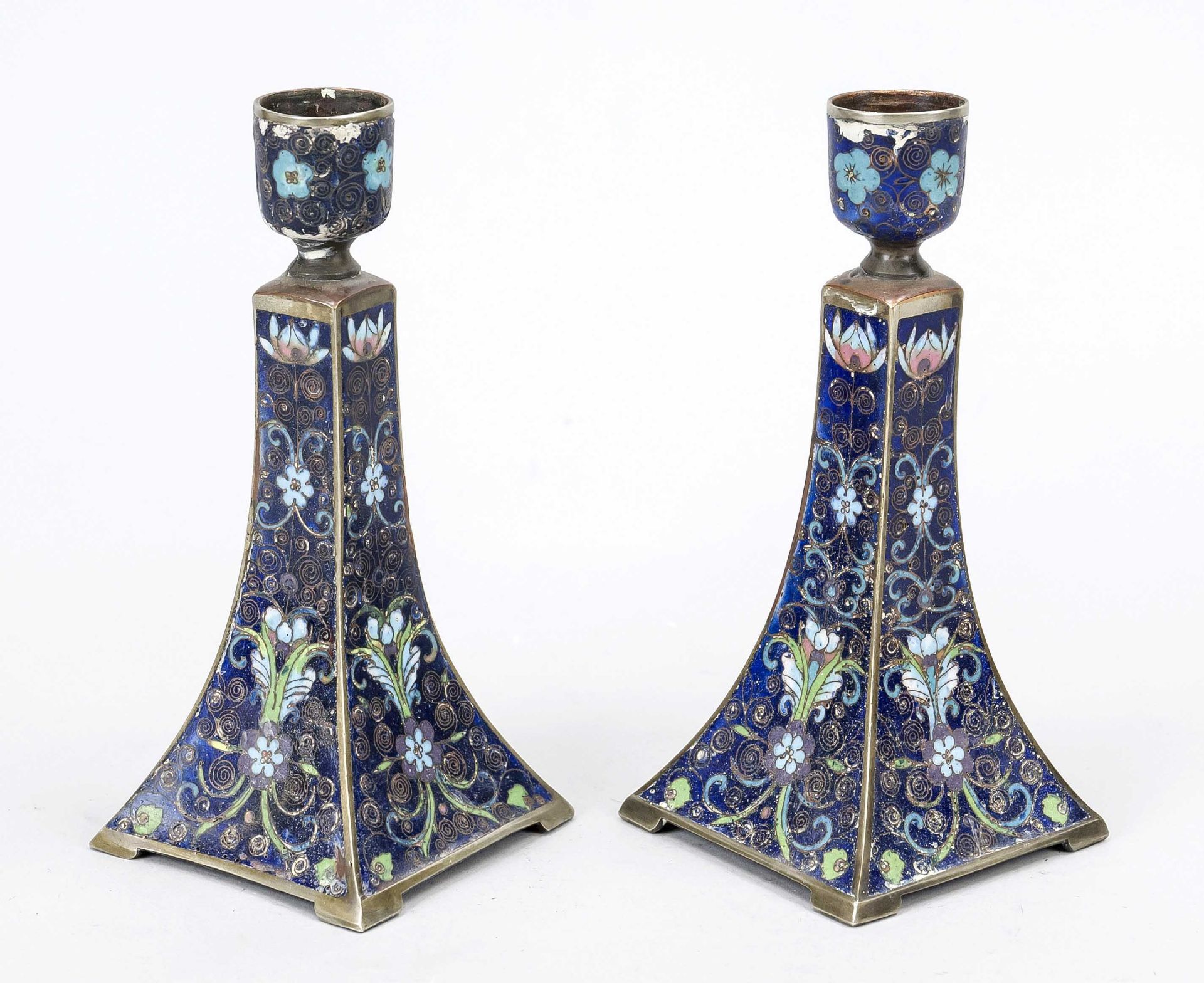 A pair of cloisonné candlesticks, Japan or China, circa 1900, lotus flowers and tendrils on a