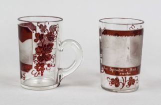 Pair of souvenir glasses, c. 1900, cylindrical shape, handles attached to the sides, clear glass,