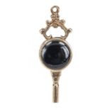 antique pocket watch key, GG 375 - 9ct., 19th century, with onyx and jasper, length 3cm, weight