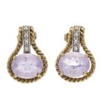 Amethyst ear studs GG/WG 375/000 with nuts GG 585/000 with cord edge, set with 2 oval faceted