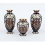 Cloisonné vase set, Japan c. 1900 (Meiji). A pair and a smaller one, rubbed and slightly chipped, h.