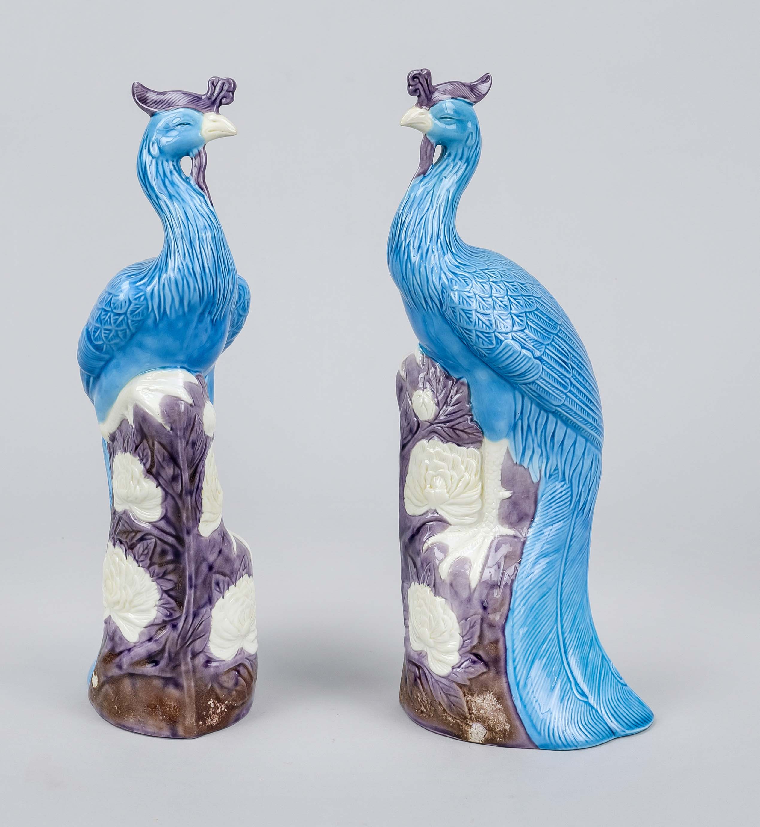 Pair of phoenix figures, China, 20th century, polychrome painted and glazed, glaze on base