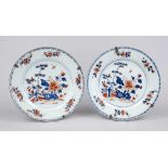 Pair of Imari plates, China 18th century (Qing). Decorated under and on the glaze in cobalt blue,