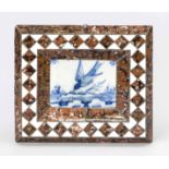 Tile painting, probably Holland 18th/19th century, bird over landscape in cobalt blue, frame
