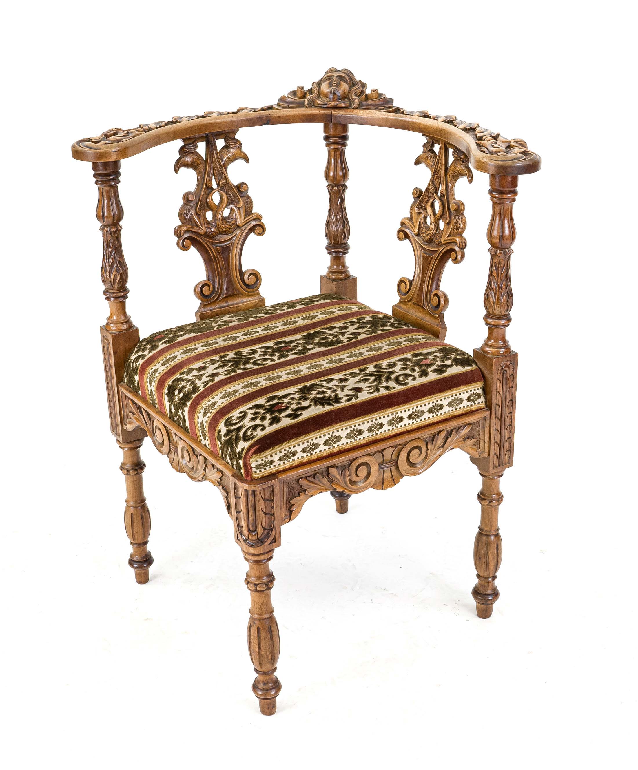 Historicism corner chair from around 1880, walnut, partly sculptural carving typical of the