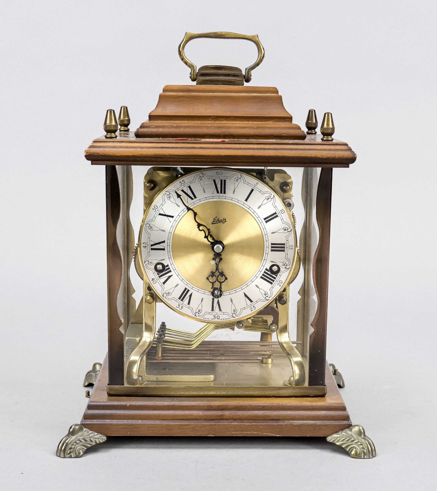 Walnut table clock, 2nd half 20th century, clock set on a base, gilded dial with applied silver-