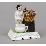 Humorous match holder, late 19th century, polychrome painted and glazed porcelain. Little boy