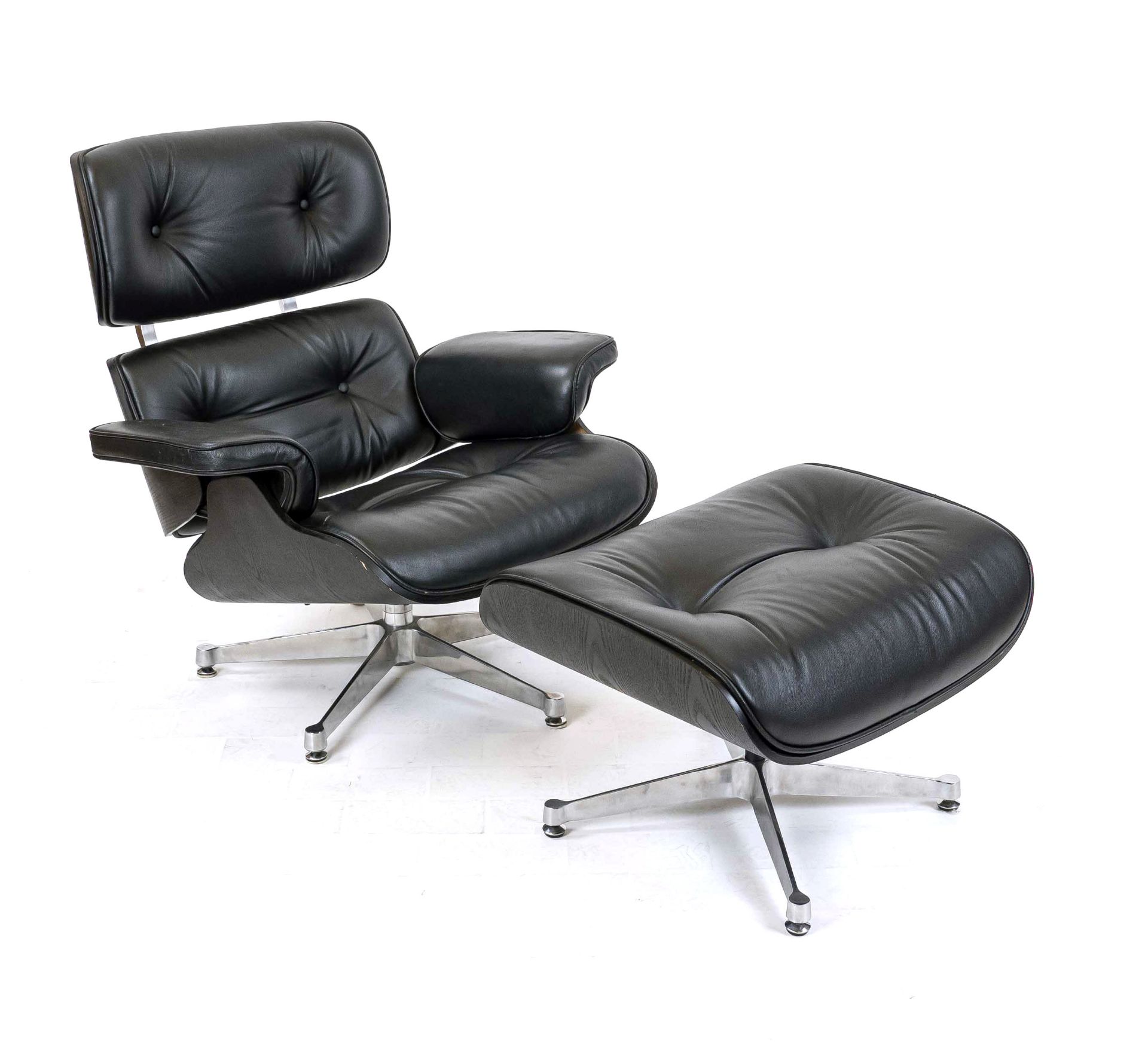 Armchair with stool, 20th century, in the style of Charles Eames, quilted black leather, 84 x 87 x