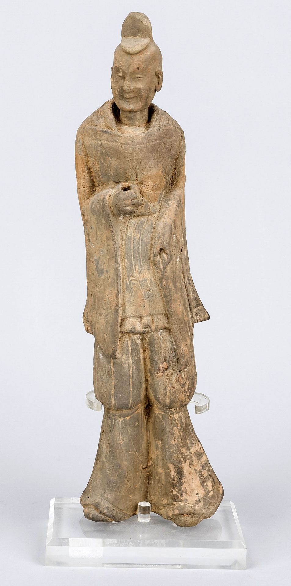 Figure of a courtier, China, probably Jin dynasty. Terracotta/stoneware with gray-beige body.