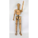 Life-size articulated doll (of a child), probably Germany, c. 1900, solid, made of various woods,