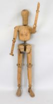 Life-size articulated doll (of a child), probably Germany, c. 1900, solid, made of various woods,