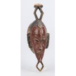 Two African dance masks, carved and painted wood, chipped H. to 49 cm