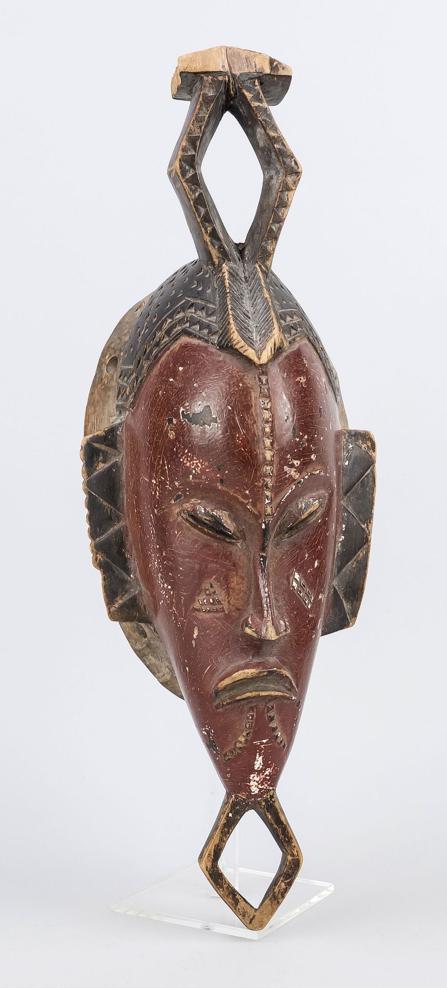 Two African dance masks, carved and painted wood, chipped H. to 49 cm