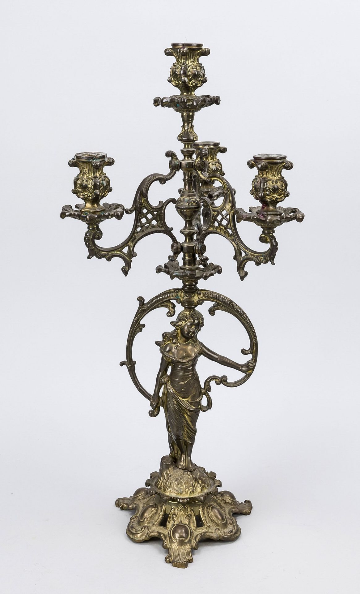 Figural candlestick, late 19th century, bronze with residual gilding. Openwork base, vase nozzles,