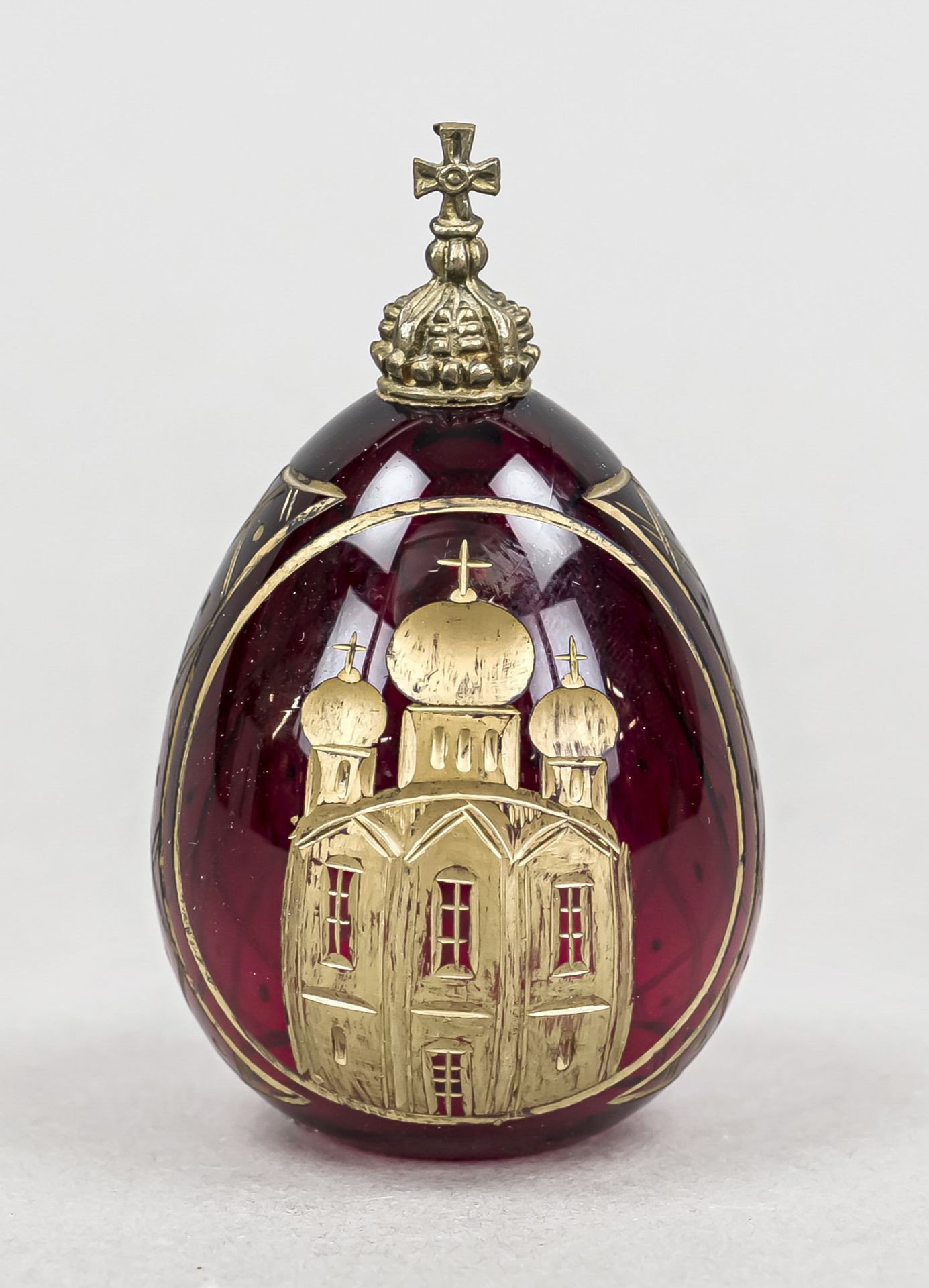 Decorative egg, Russia, red glass with cut decoration, architectural view, gold staffage, with brass