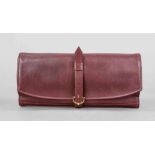 Cartier, leather case (travel case for jewelry?), burgundy smooth leather, gold-coloured hardware,