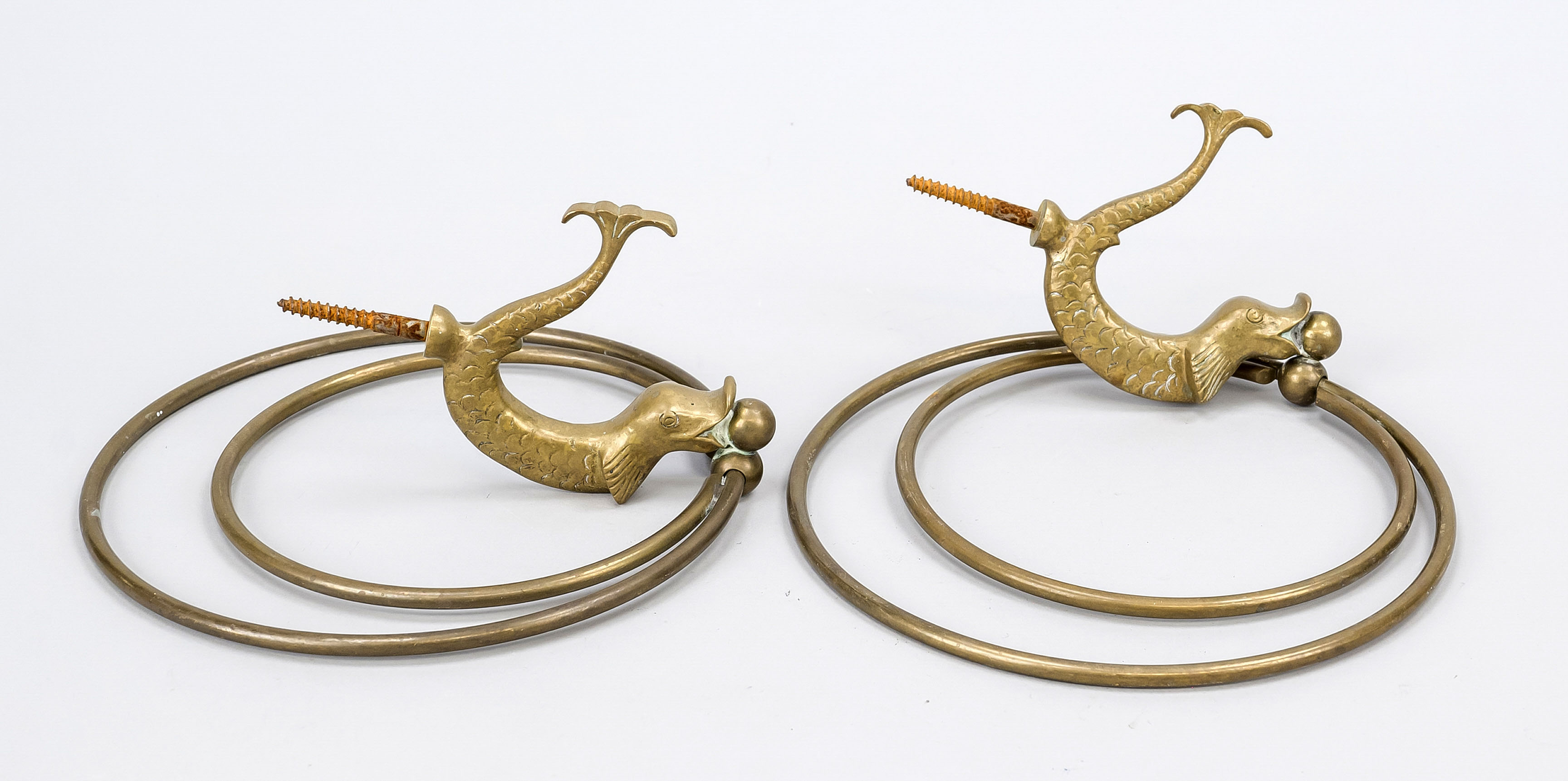 Pair of towel rails in the shape of dolphins, around 1900, brass. Two dolphins with screw