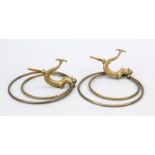 Pair of towel rails in the shape of dolphins, around 1900, brass. Two dolphins with screw