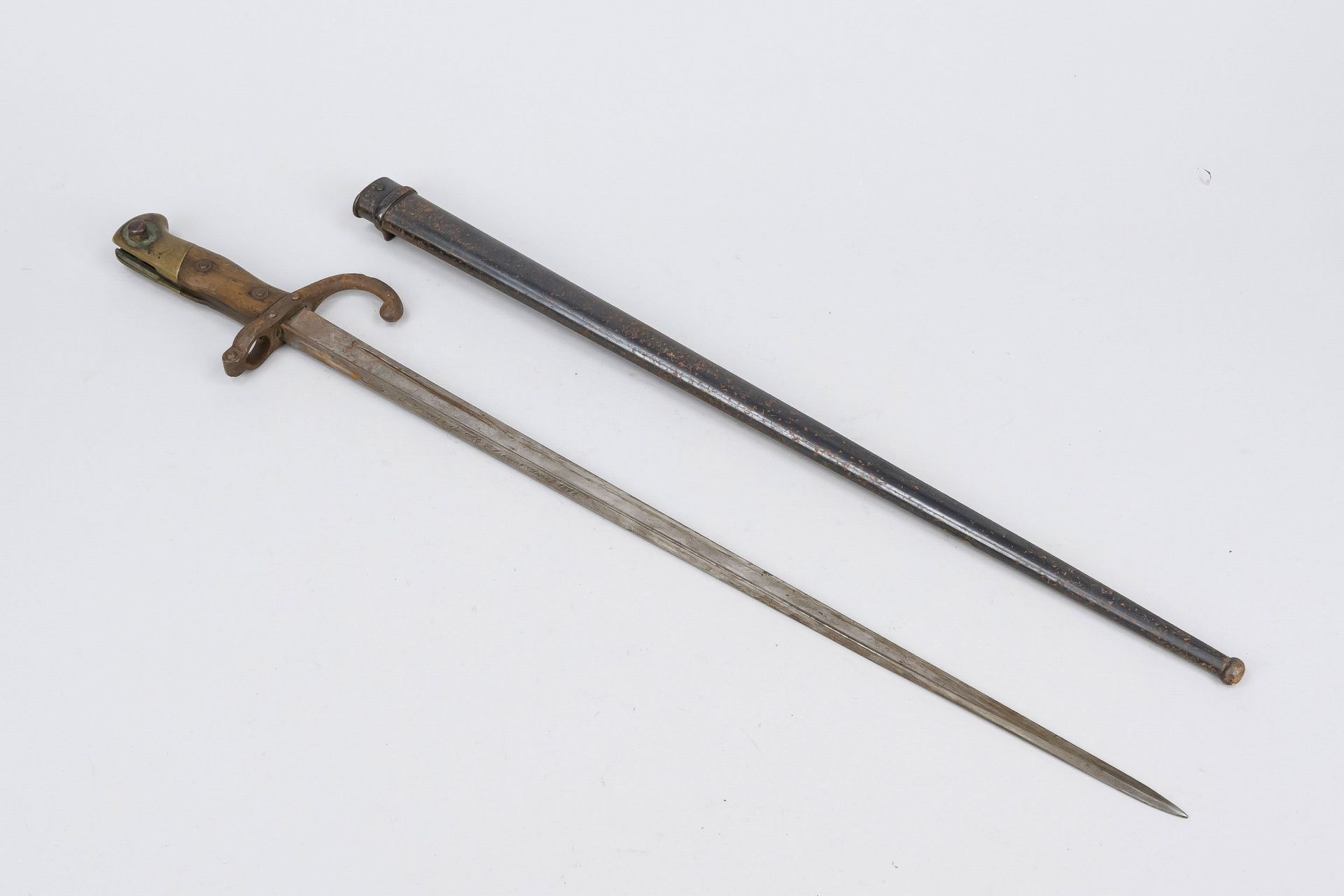 Bayonet, 2nd half 19th century, France. Model M1874. Straight single-edged blade with broad T-shaped