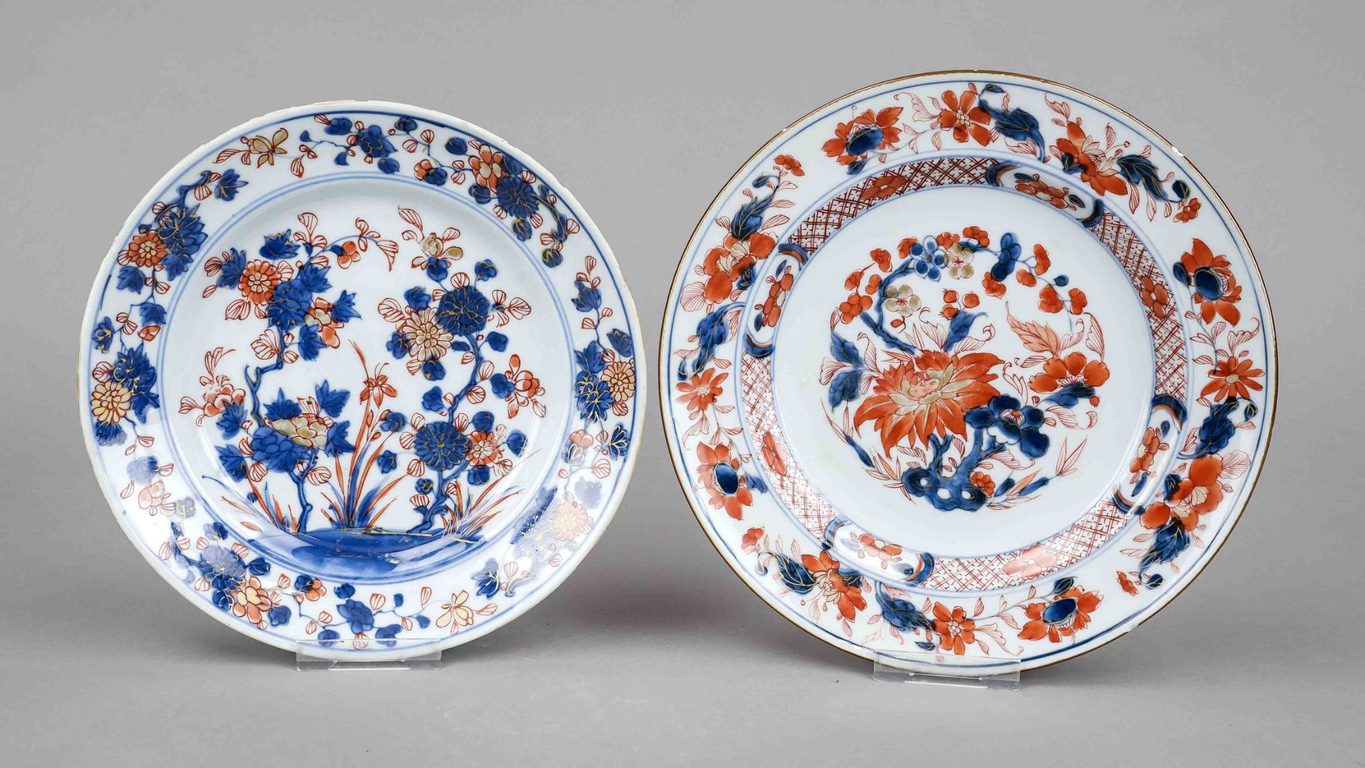 Two export Imari plates, China 18th century, both with floral decoration in cobalt blue, iron red