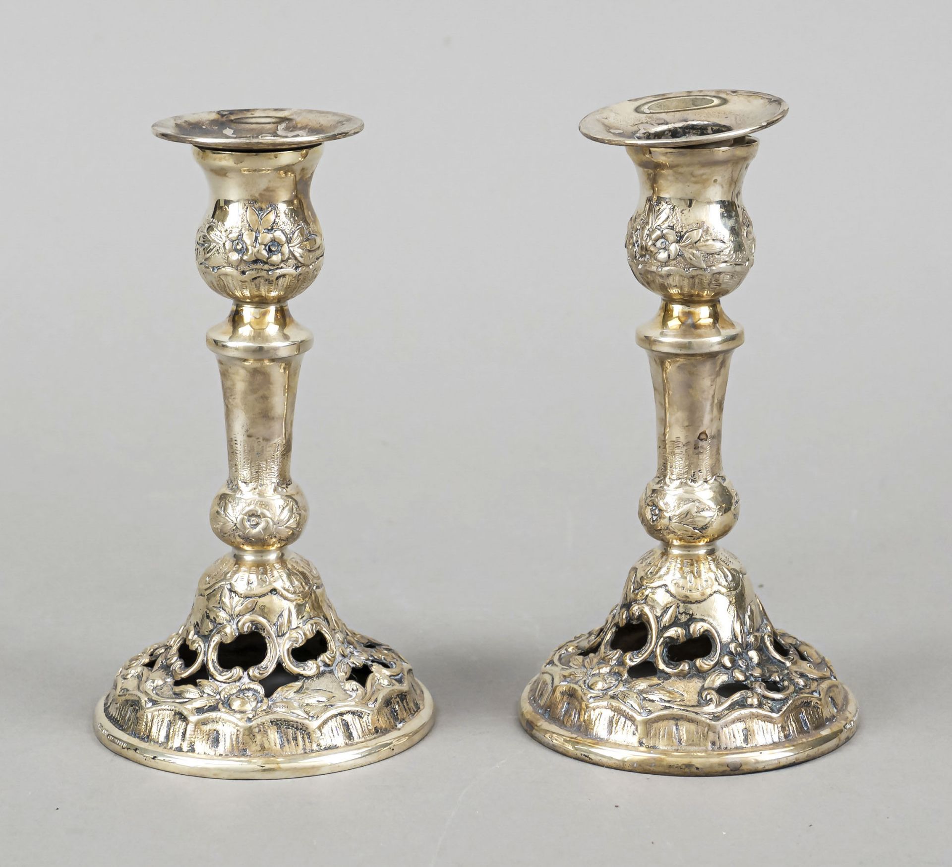 Pair of candlesticks, German, 20th century, silver 800/000, round domed and pierced stand,