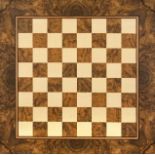 Large chessboard, probably Germany 20th century, fine veneer work of burl and birch wood. Signed