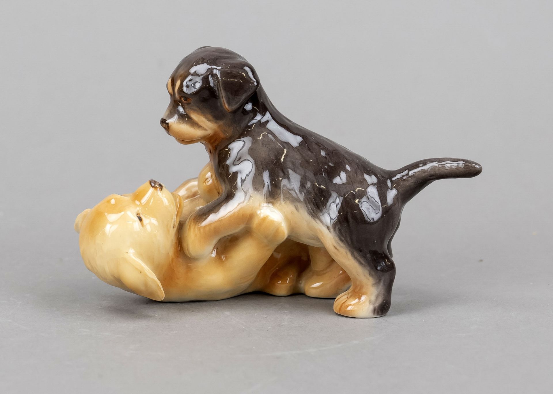 Playing dogs, Royal Copenhgen, late 20th century, design by Allan Therkelsen, golden retriever and