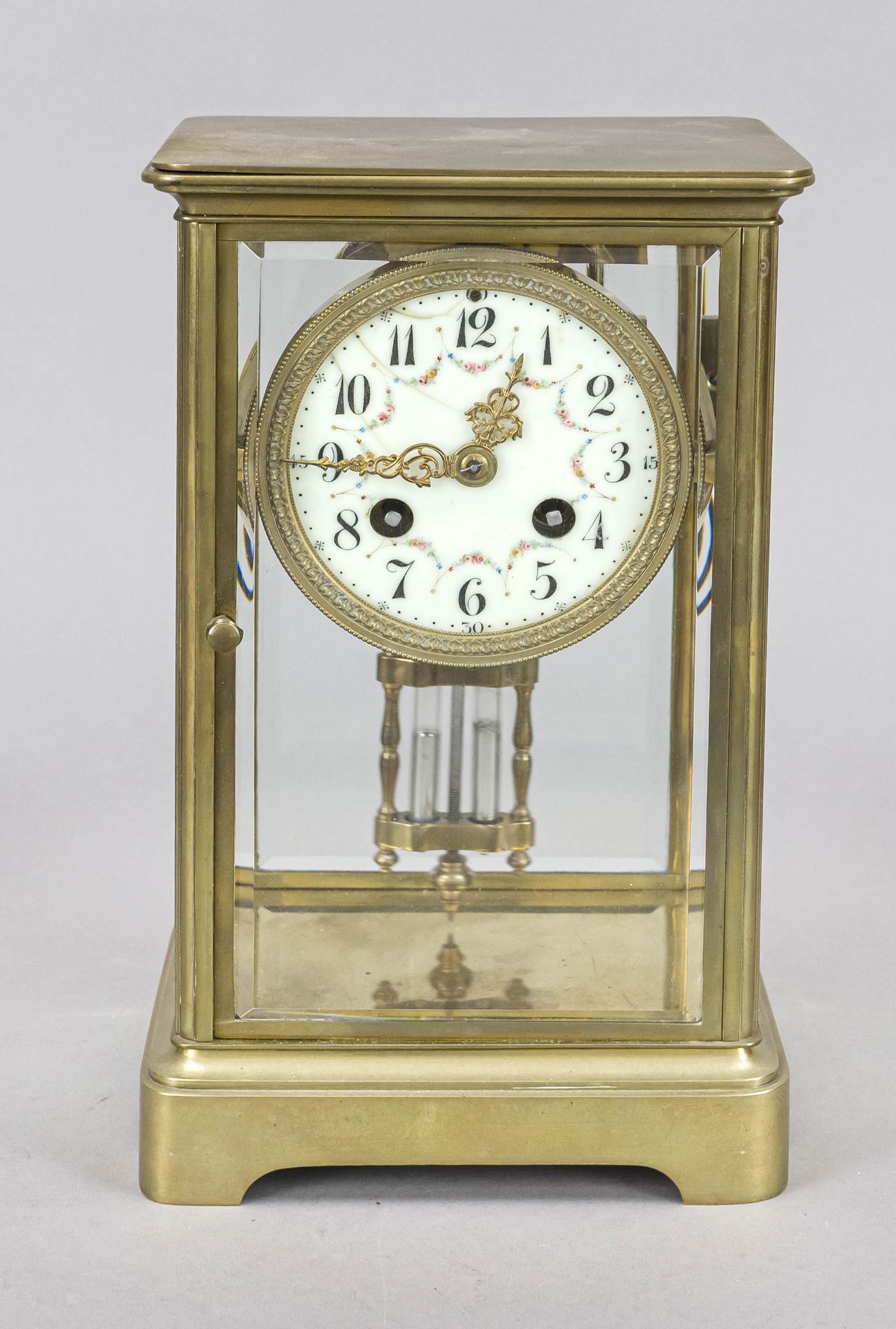 Gilt brass table clock, France circa 1900, faceted glass on all sides, free hanging movement with