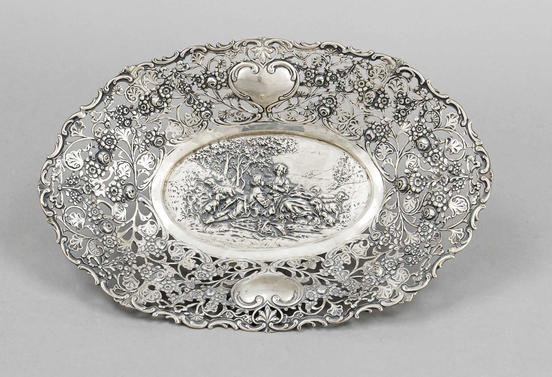 An oval openwork basket, German, 20th century, probably Hanau, silver 800/000, open-worked rim