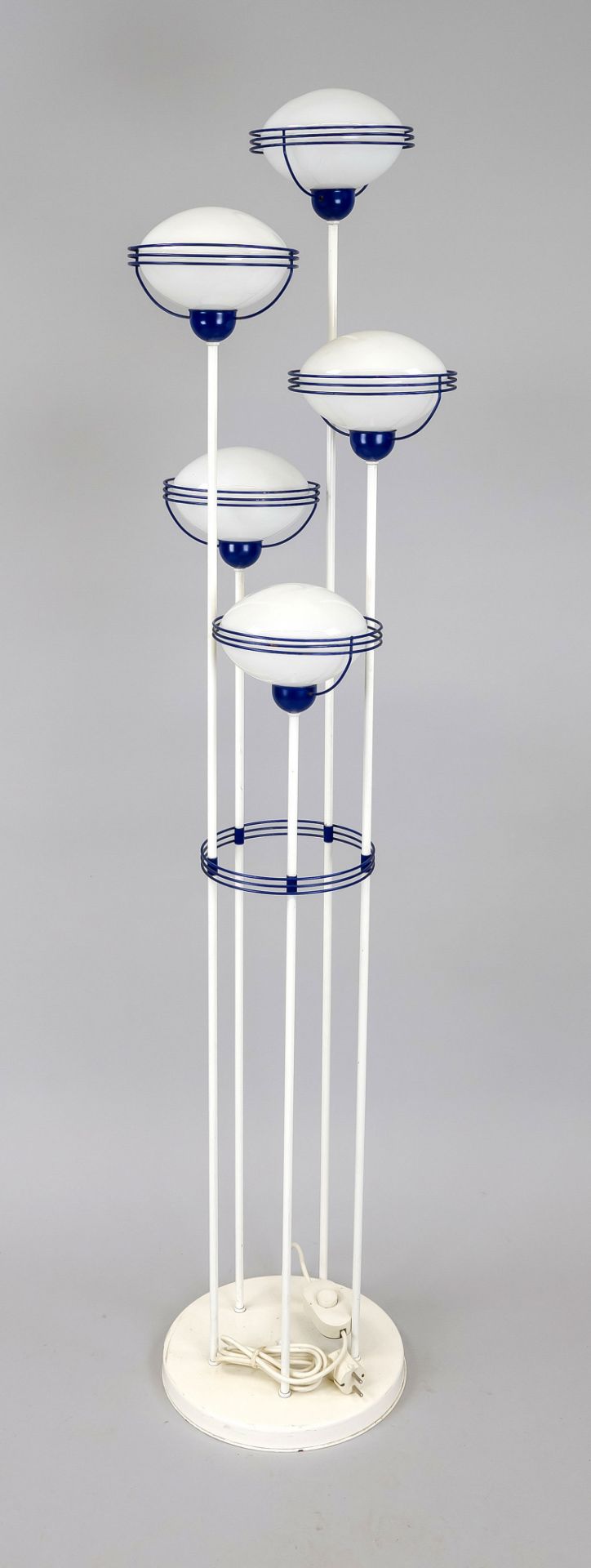 Designer floor lamp, probably 1980s. 5 slender shafts with frosted glass lampshades in various