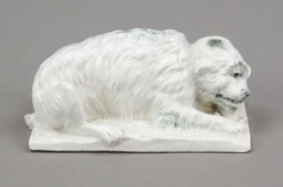 Reclining dog, Fritz Krug, Lauf/Bavaria, impressed mark 1902-68, on rectangular plinth, reduced