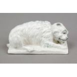 Reclining dog, Fritz Krug, Lauf/Bavaria, impressed mark 1902-68, on rectangular plinth, reduced