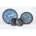 Four cloisonné plates, Japan c. 1900 (Meiji). 1 pair small black-ground, the others blue. All with