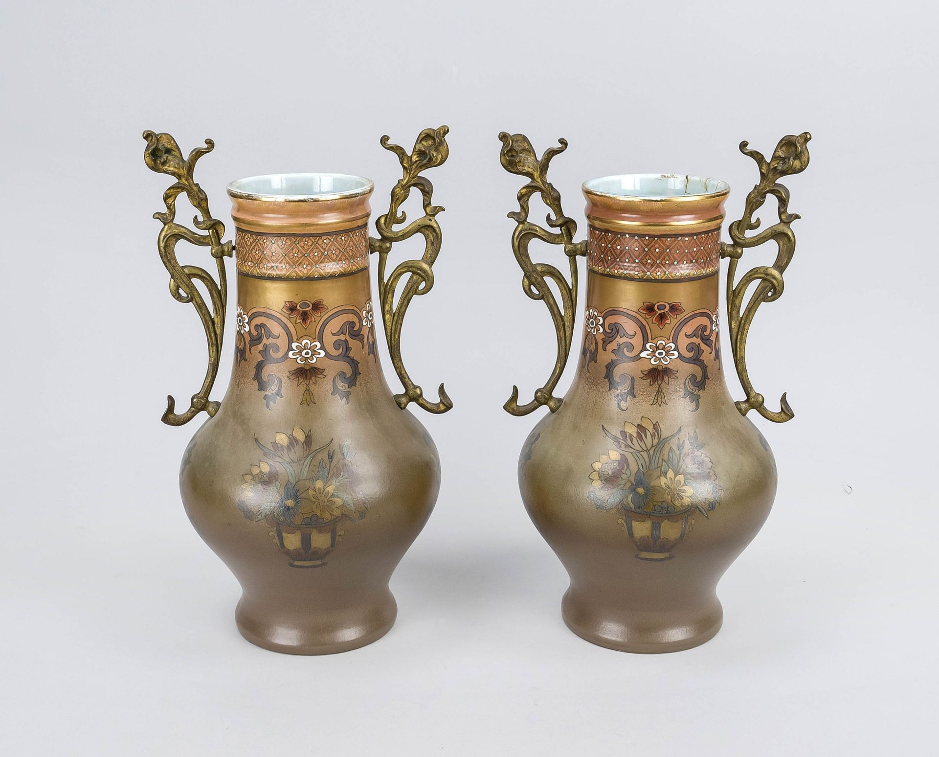 A pair of Art Nouveau vases, circa 1900, ceramic, floral painted, organic brass handles, one glued