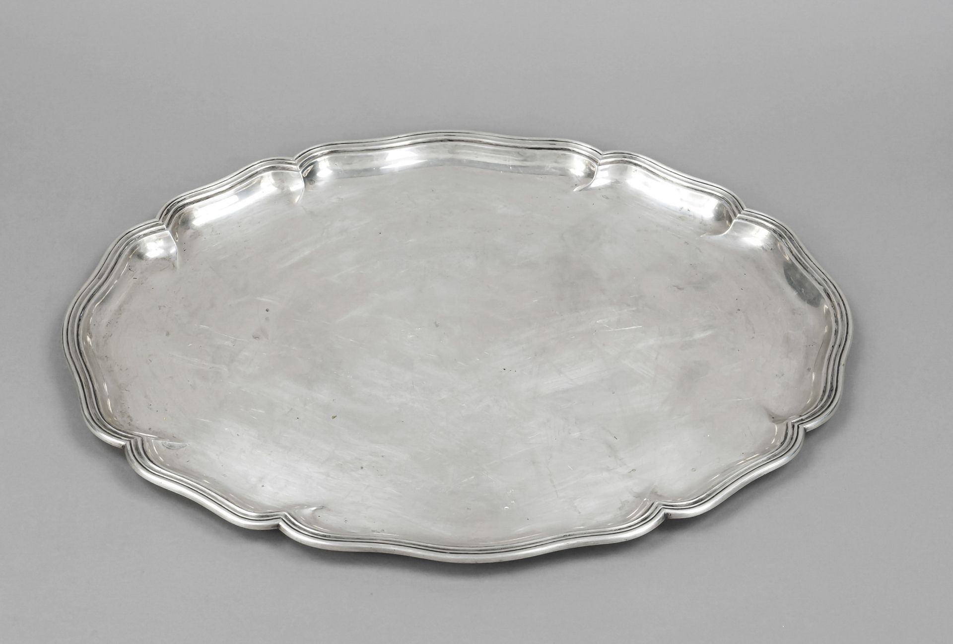 A large oval tray, German, 20th century, maker's mark M. H. Wilkens & Söhne, Bremen-Hemelingen,