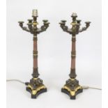 Pair of Empire chandeliers mounted as lamps (mariage), partially gilt bronze. Open-worked, trefoil