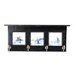 Dutch coat rack, black lacquered wood with three Delft tiles, four hooks, 30 x 70 cm