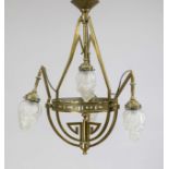 Ceiling lamp, late 19th century, three-pass brass frame with pointed volutes and openwork wreath.