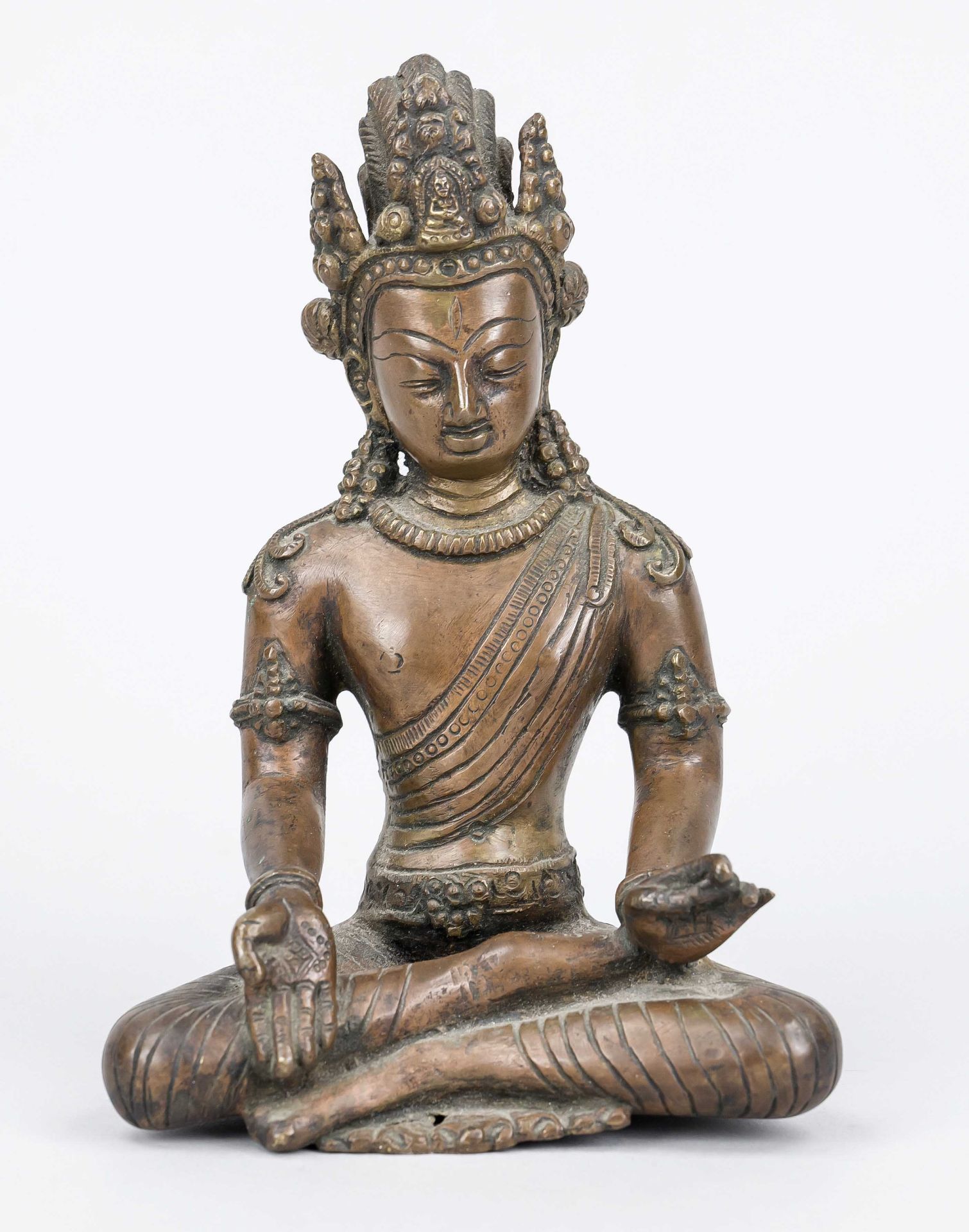 Bodhisattva, Tibet, probably 19th century, bronze. In padmasana, hands showing mudras, h. 18 cm