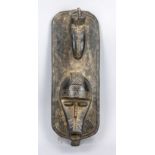 Mask of the Senufo, Ivory Coast, 20th century, dark, light wood, slightly rubbed, 52 x 20 cm