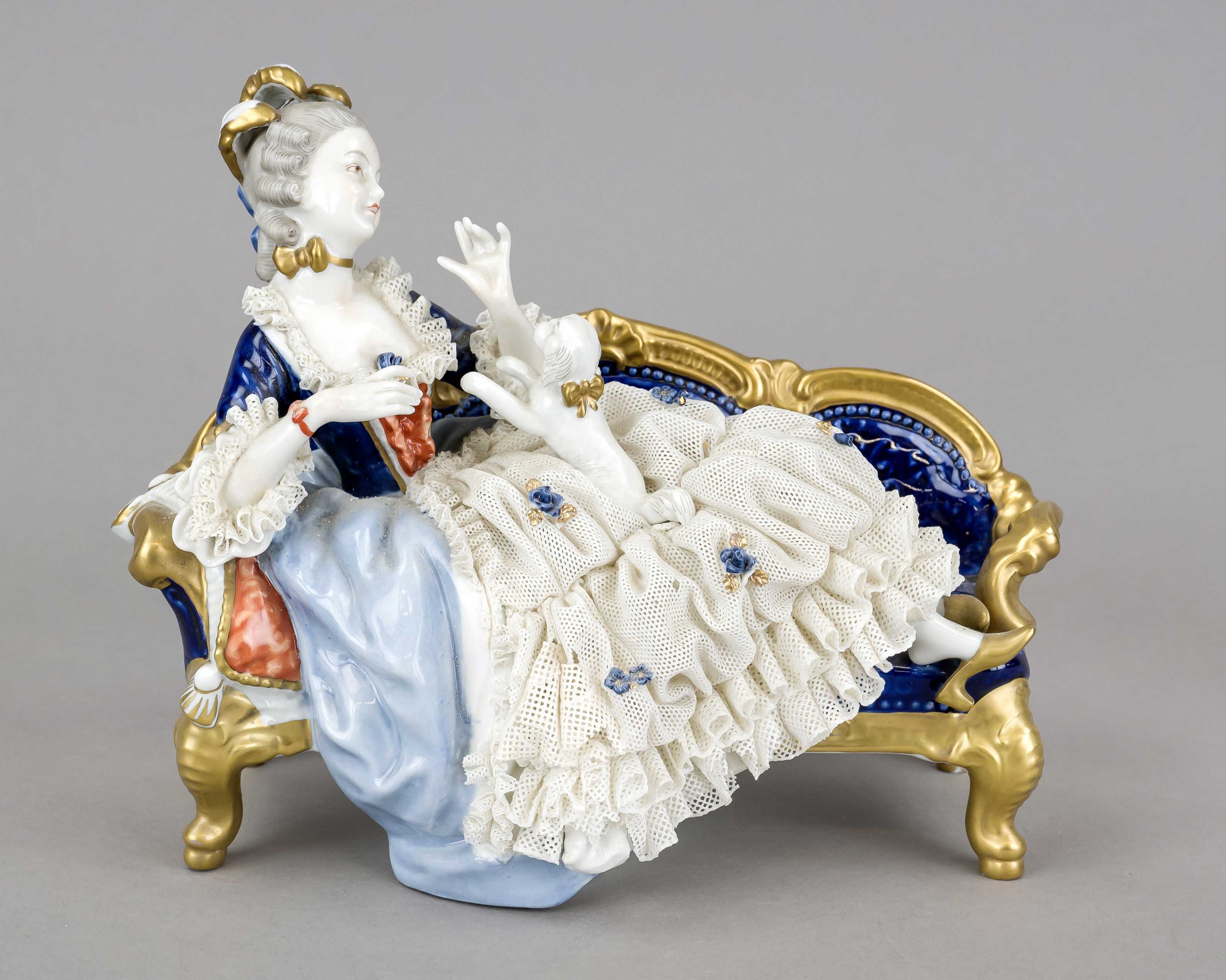 The lap dog, Unterweißbach, Thuringia, 20th century, elegant lady in a rococo dress on a sofa with