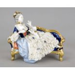 The lap dog, Unterweißbach, Thuringia, 20th century, elegant lady in a rococo dress on a sofa with