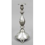 Candlestick, late 19th century, probably under-alloyed silver, round domed stand, on 3 decorated