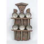 Rustic spoon board, 19th century, painted wood with 6 pewter spoons, h. 43 cm