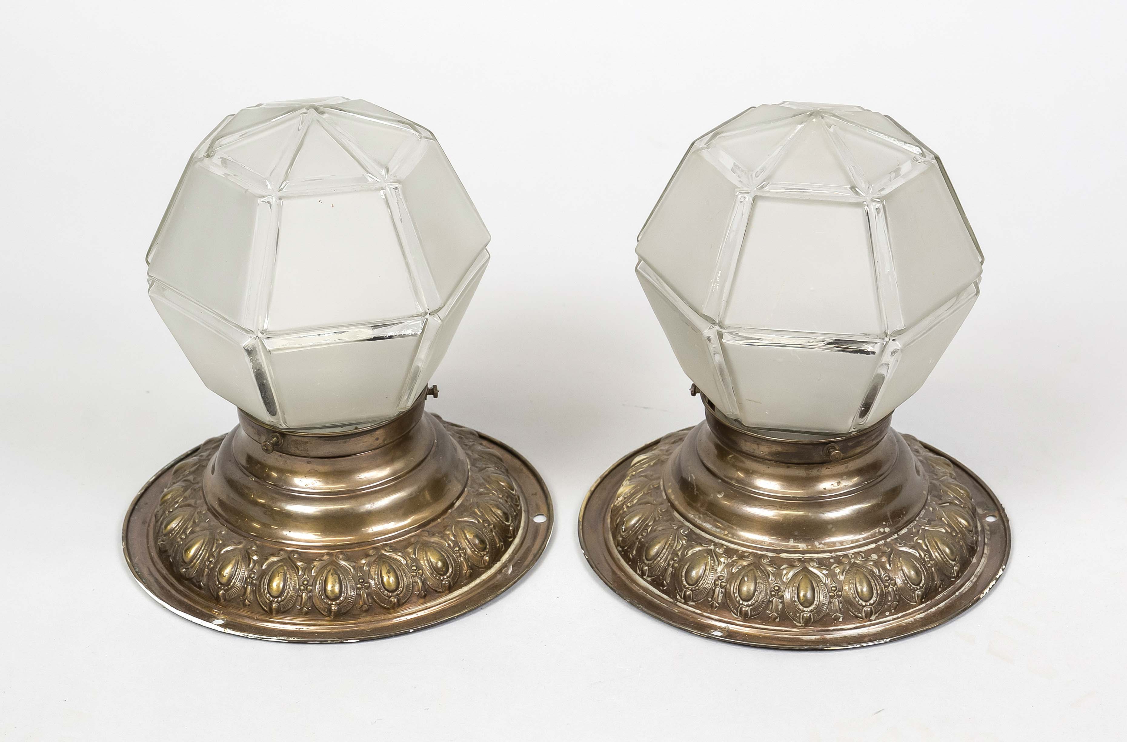 Pair of plafonds, late 19th century, ornamented brass frame, faceted shades of etched glass, rubbed,